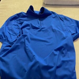 Blue Nike polo